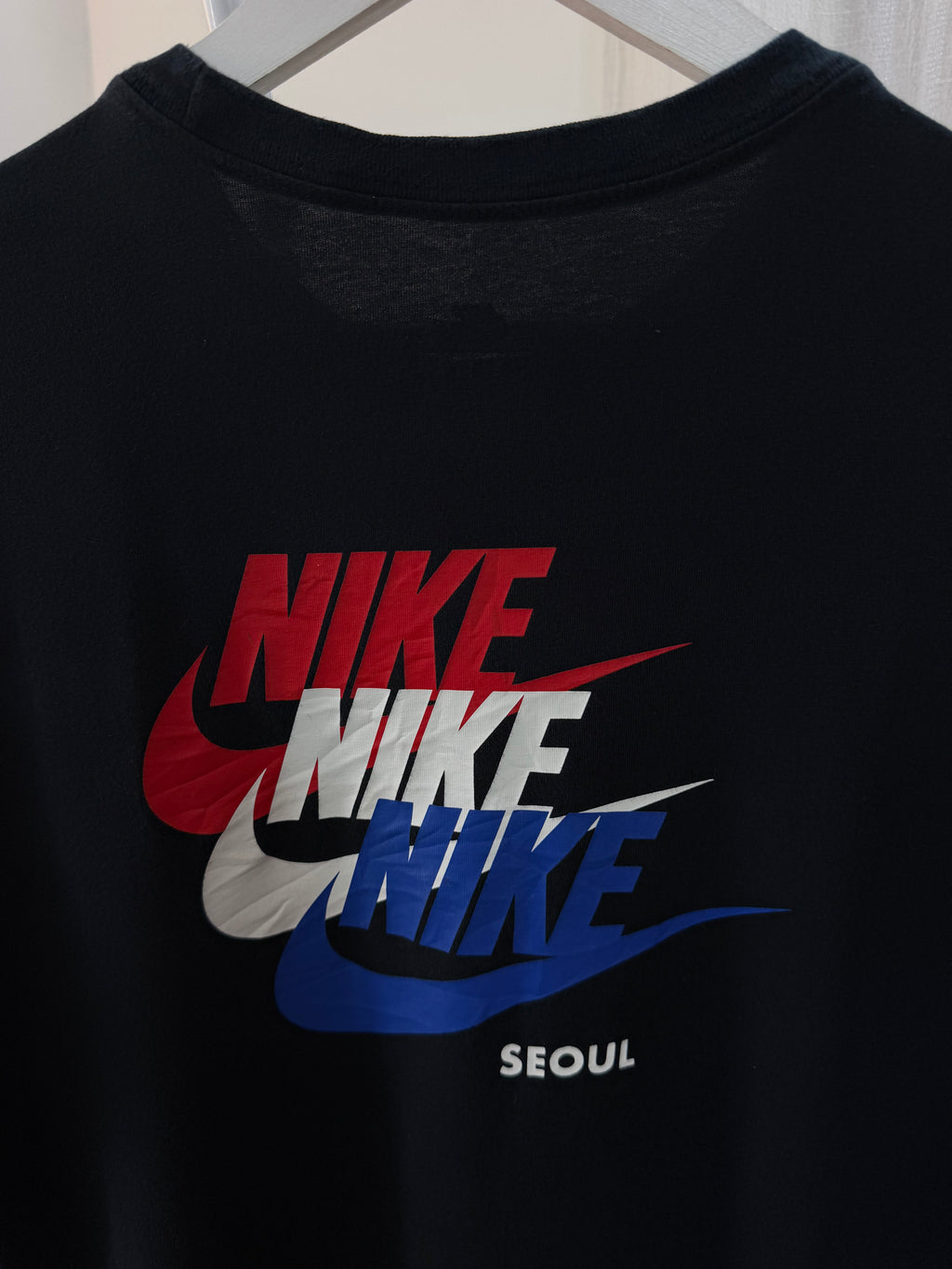 Nike black multi logo tee